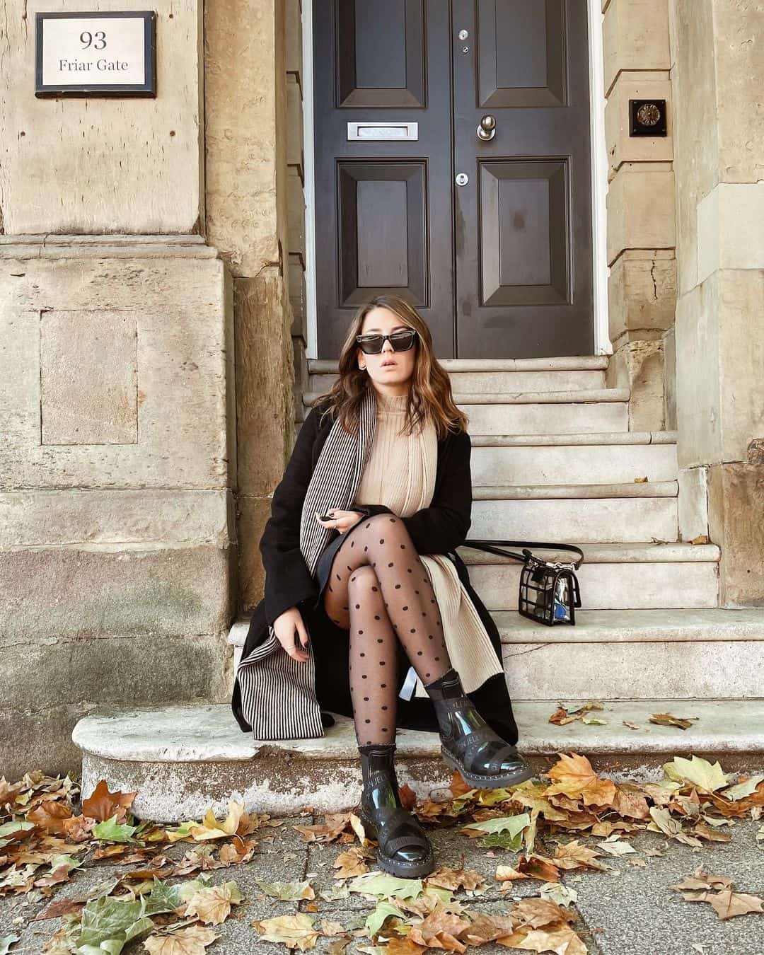 Layered outfit with polka dot tights and coat