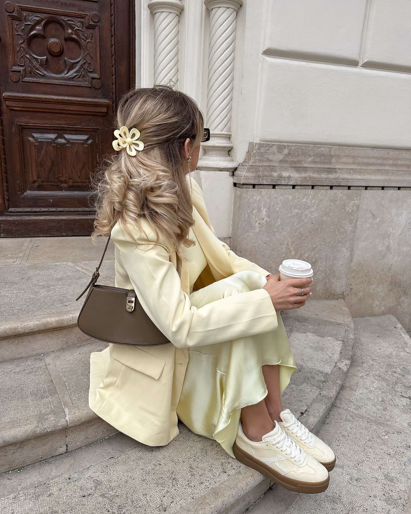 Pastel suit with sneakers and purse