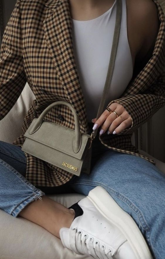 Checkered blazer with jeans and sneakers
