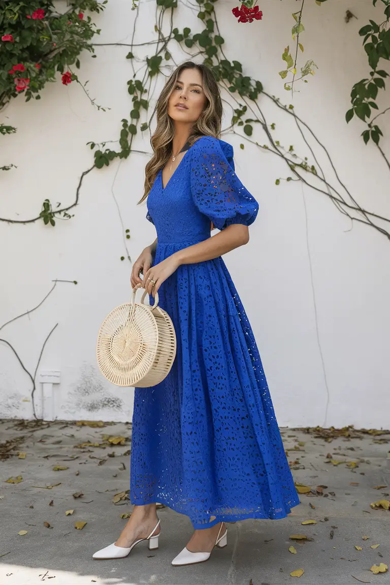 Blue eyelet dress with wicker bag