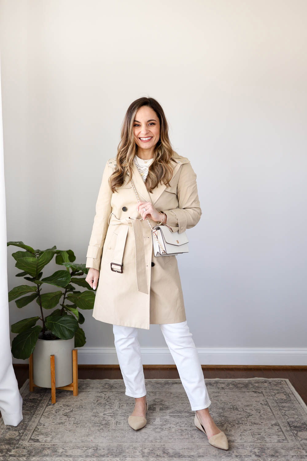 Beige trench coat with white pants