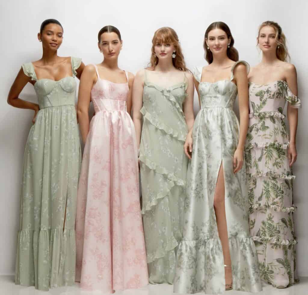 Bridesmaids in pastel floral dresses, elegant wedding fashion