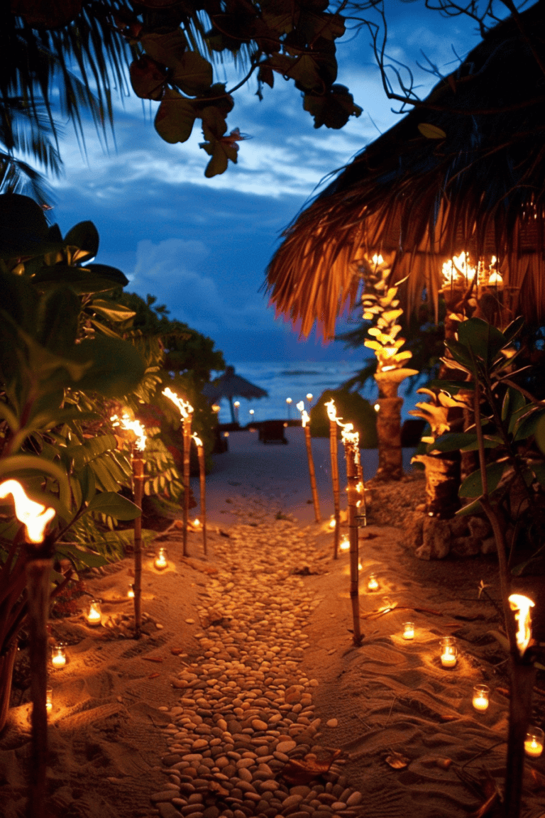 Beach pathway lined with torches and candlelight, romantic wedding setting