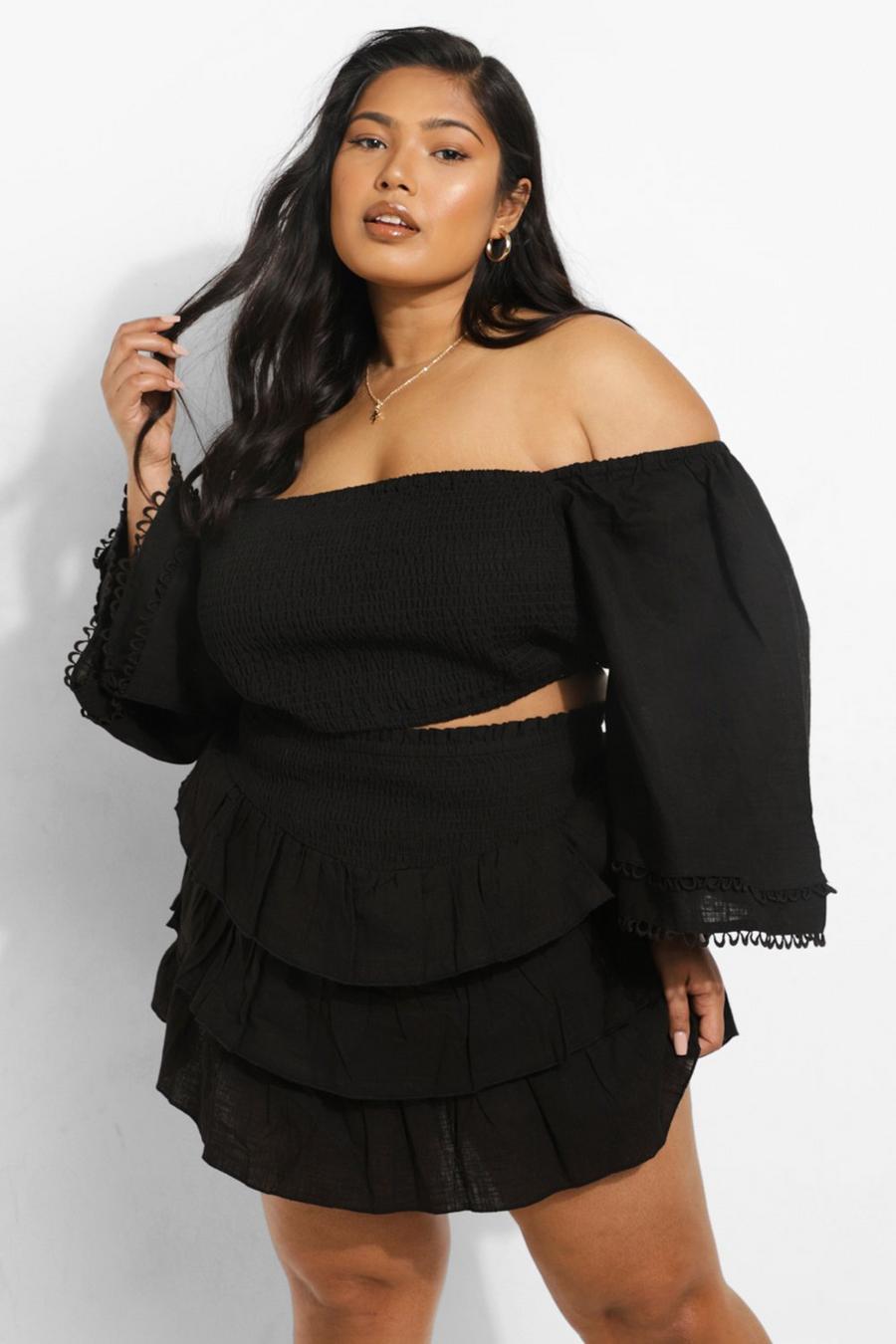 Black tiered mini skirt with off-shoulder top