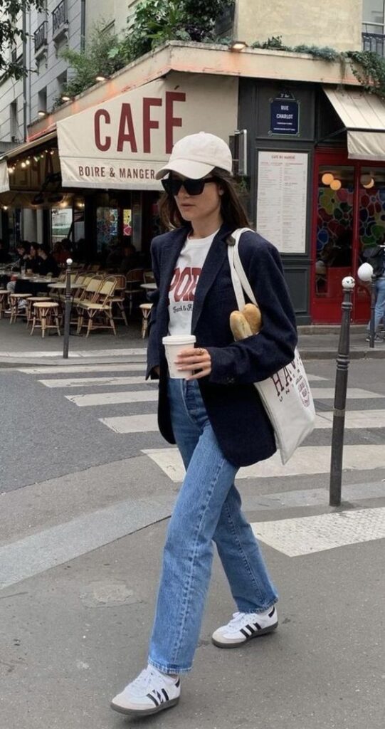 Woman in blazer and jeans, casual urban fashion