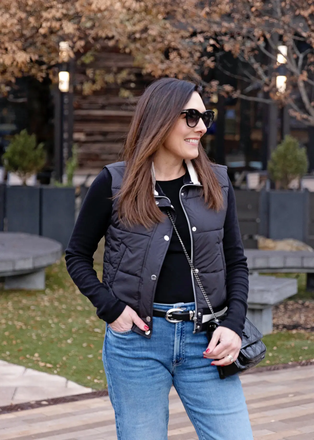 floral dress with vest and jeans