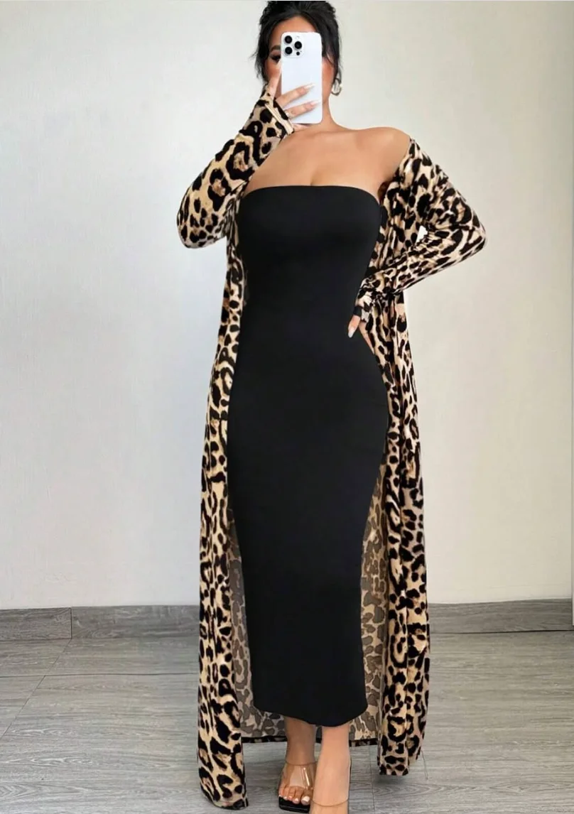 Leopard print cardigan over black tube dress