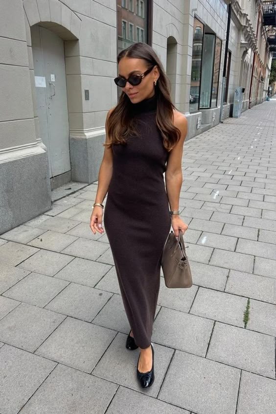 Brown knit dress with accessories, city street setting