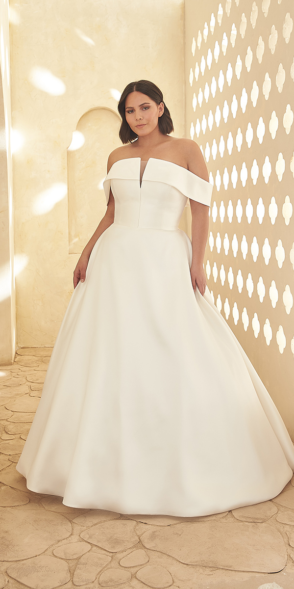 Bride in an off-shoulder elegant classic dress