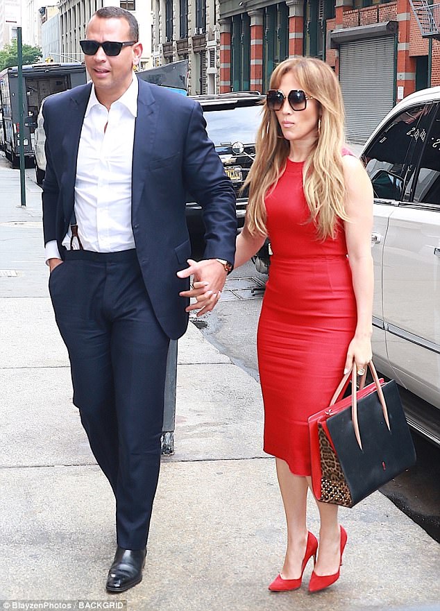 Red dress with red heels and bag
