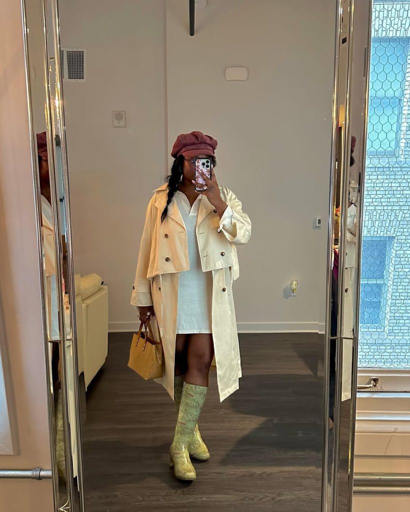 Layered spring outfit with trench coat and colorful accessories