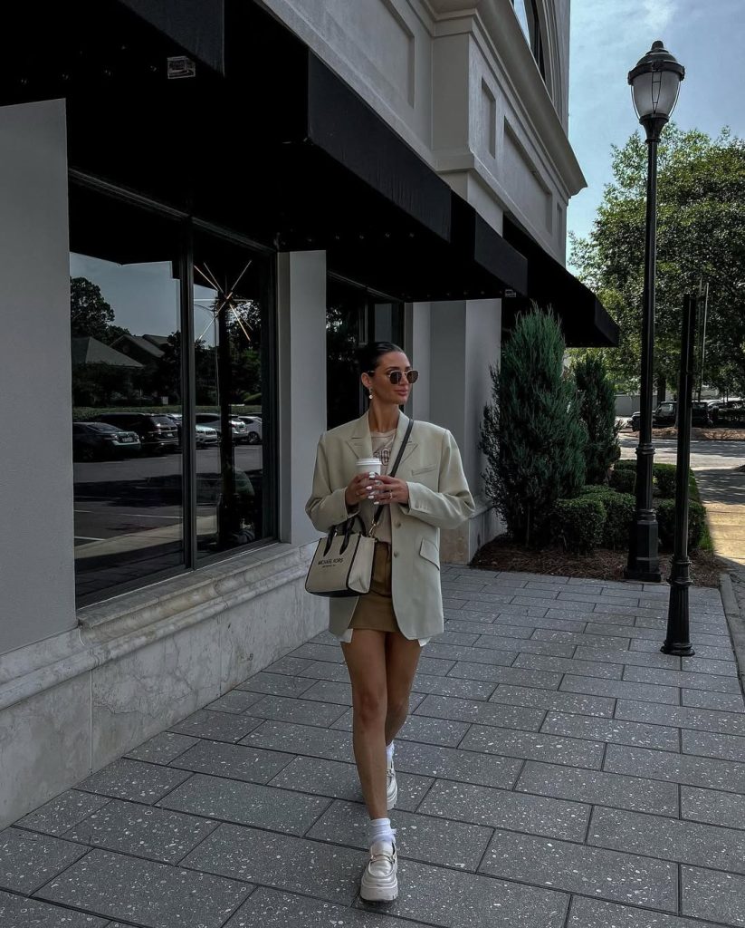 Urban chic blazer and skirt outfit, ideal for city style