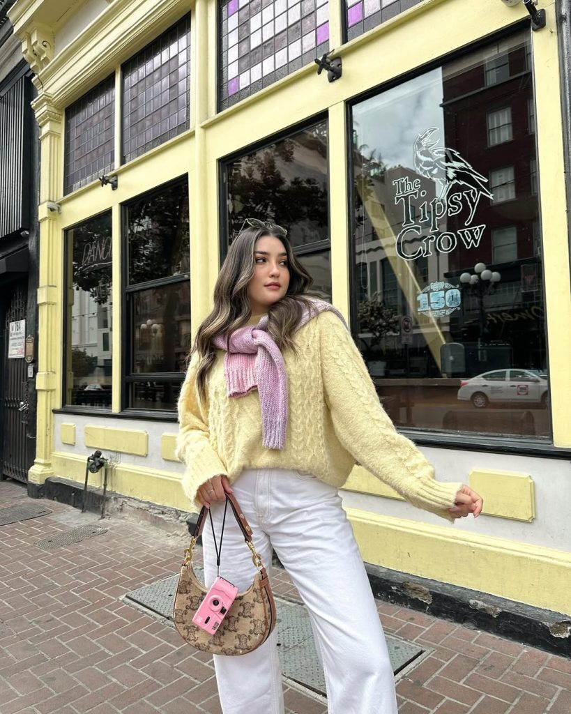 Sunny pastel sweater and white jeans, perfect for spring brightness