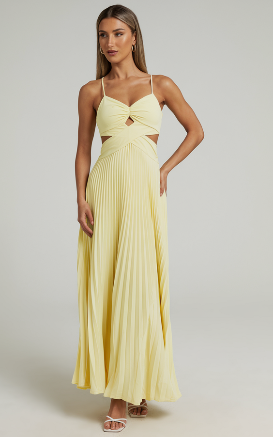 Yellow pleated dress with cut-out details