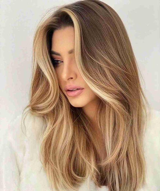 Golden honey streaks, radiant brunette trend