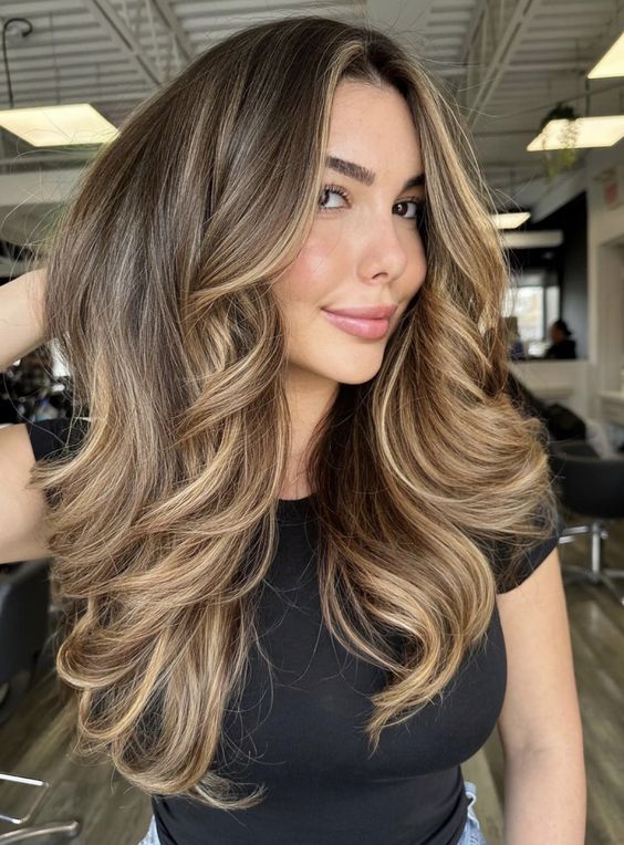 Soft caramel waves, inviting brunette style