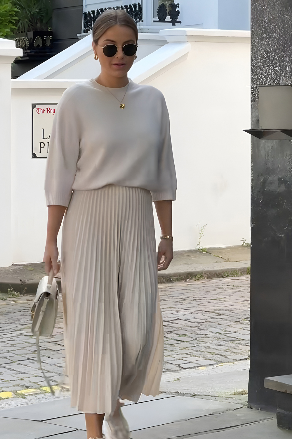 Pleated skirt with a matching top in a monochrome palette