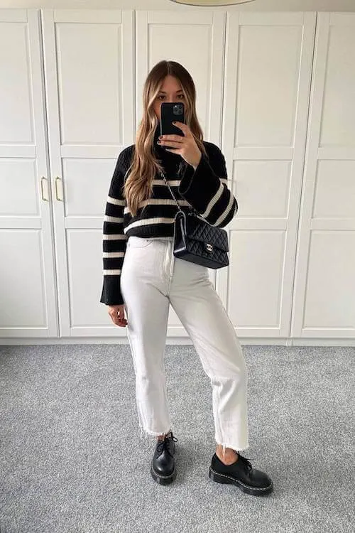 Black and white striped sweater with white jeans for a classic look