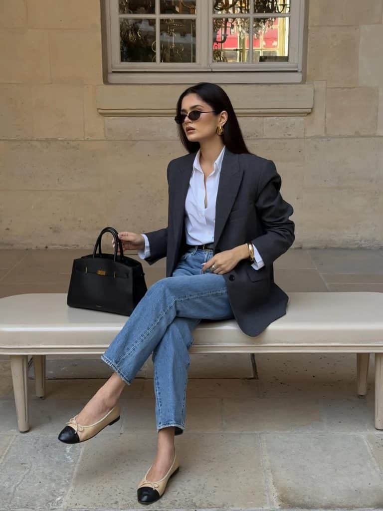 Dark blazer with straight jeans and a white shirt
