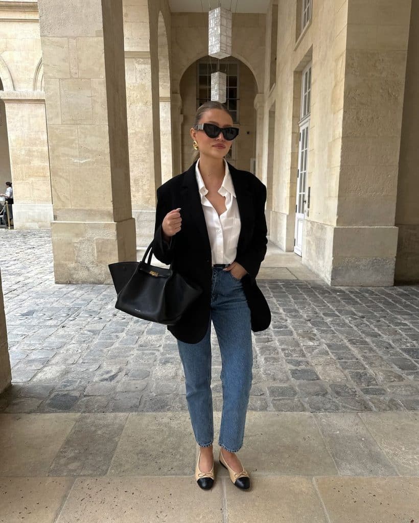 Black blazer with jeans and a white shirt for a powerful look