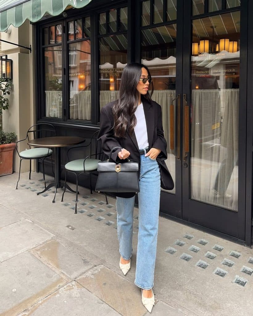 Monochrome outfit with black blazer and light jeans