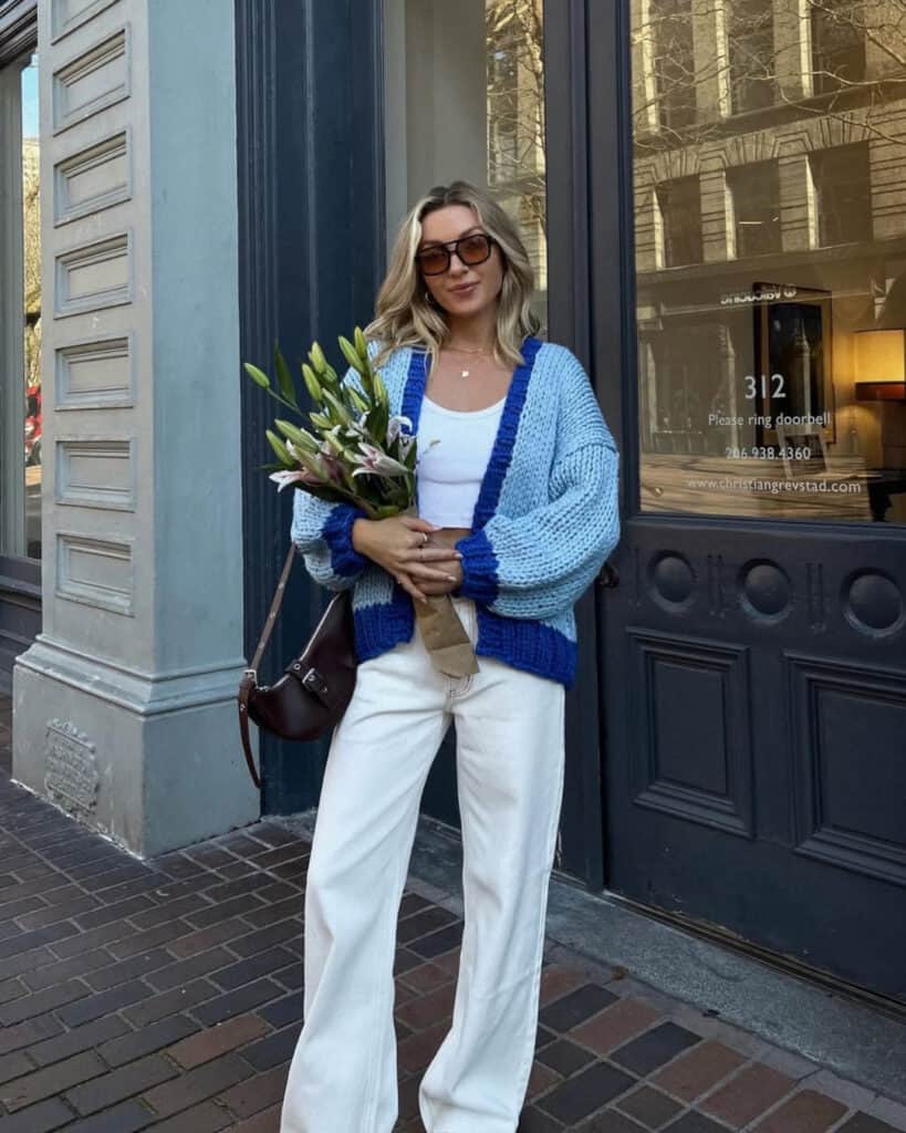 Blue cardigan with white pants, spring street style 2026