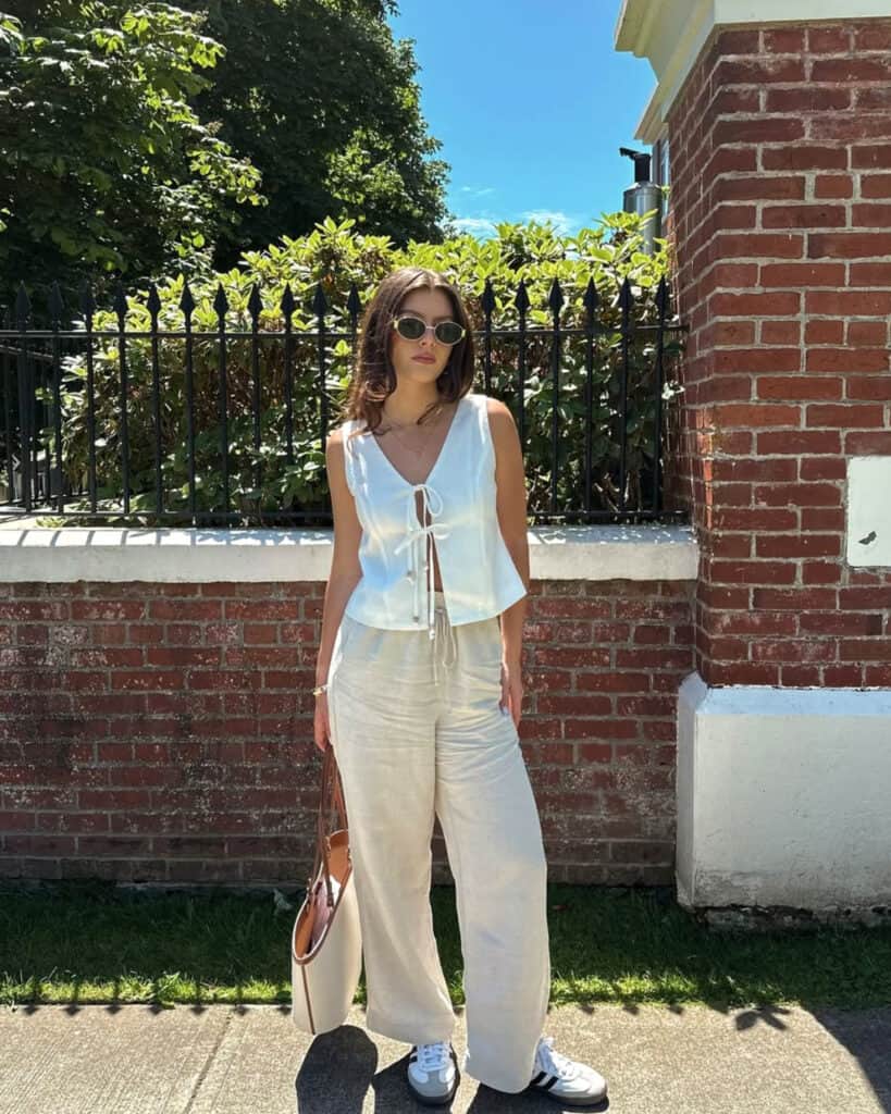 White tie-front top with linen pants, airy spring style 2026