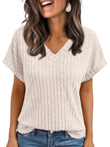 Beige ribbed knit top with jeans, relaxed spring fashion 2026