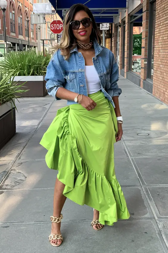 Vibrant green skirt, fresh statement, spring fashion, bold colors, lively style.
