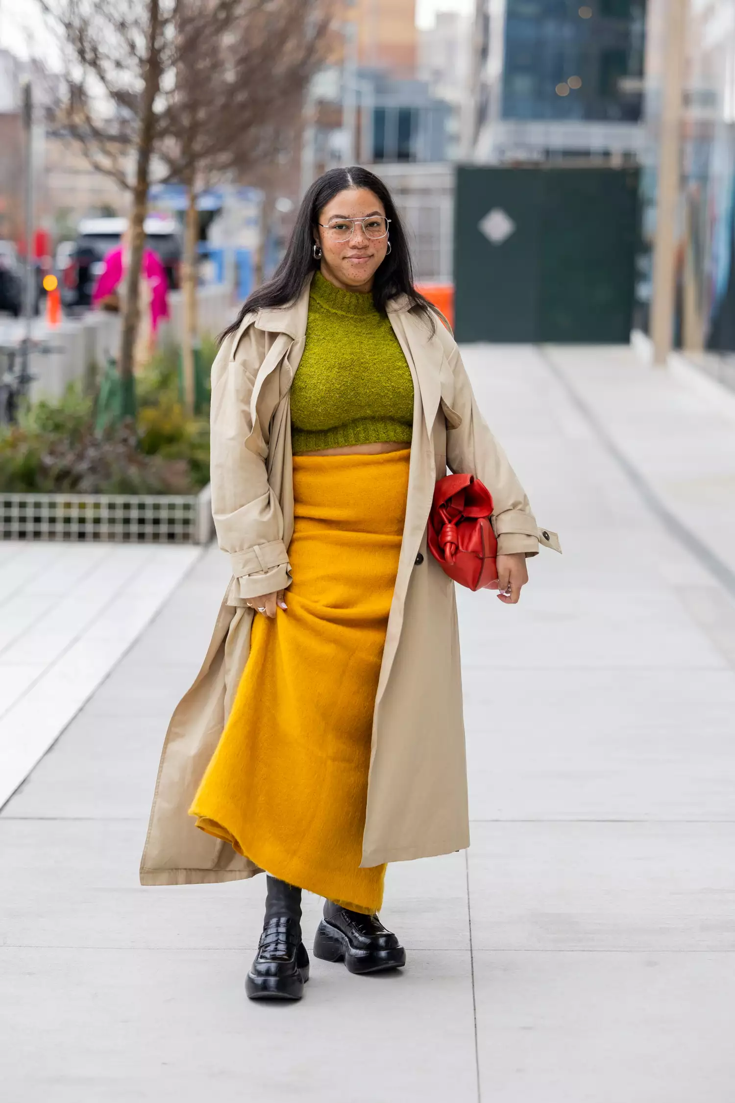 Layered fashion, bold colors, textured outfit