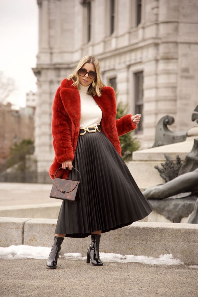 Red coat, pleated skirt, bold fashion