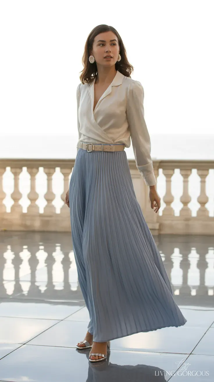 Pastel blue pleated skirt, elegant blouse, graceful fashion