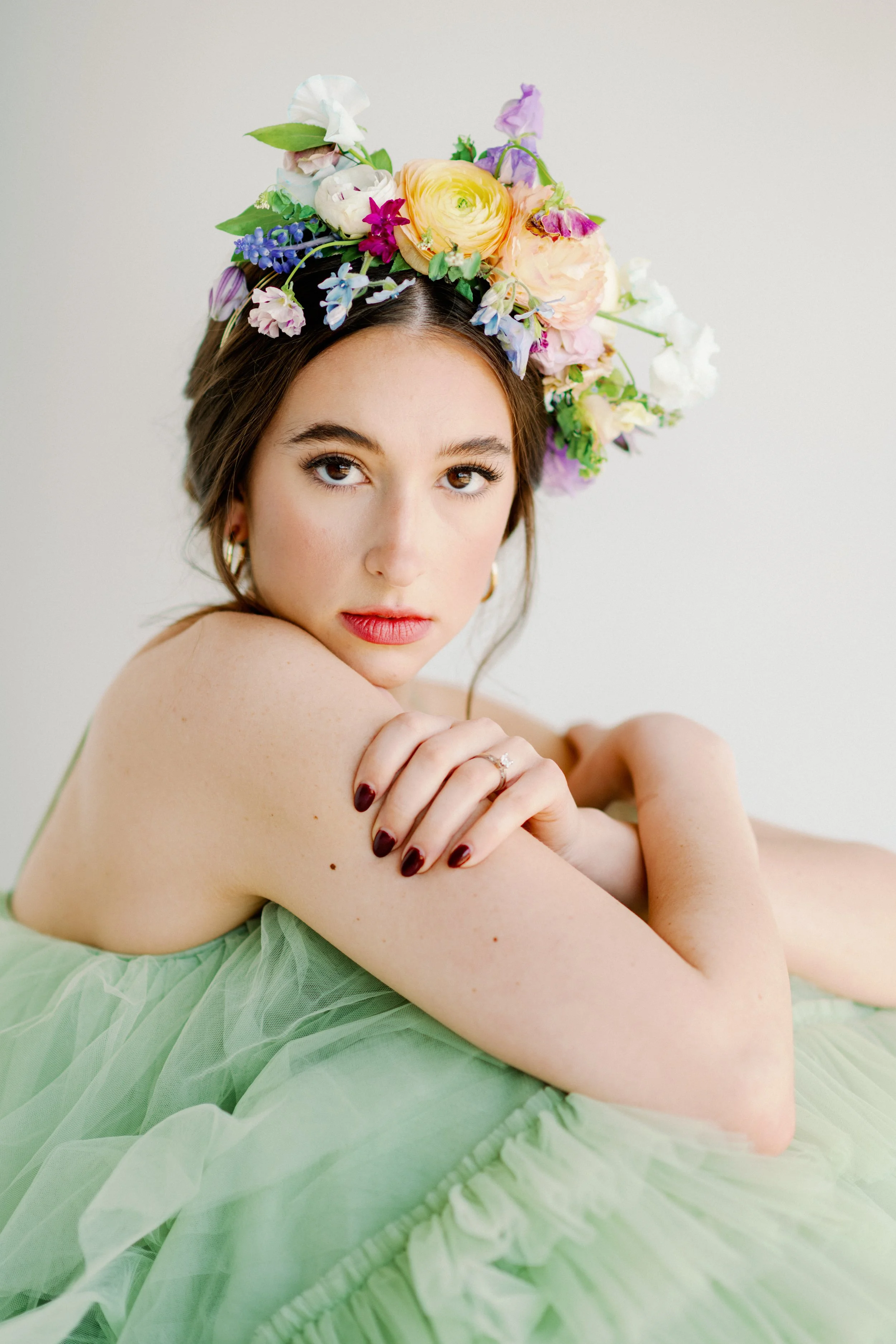 Whimsical floral crown on bride, spring wedding accessory