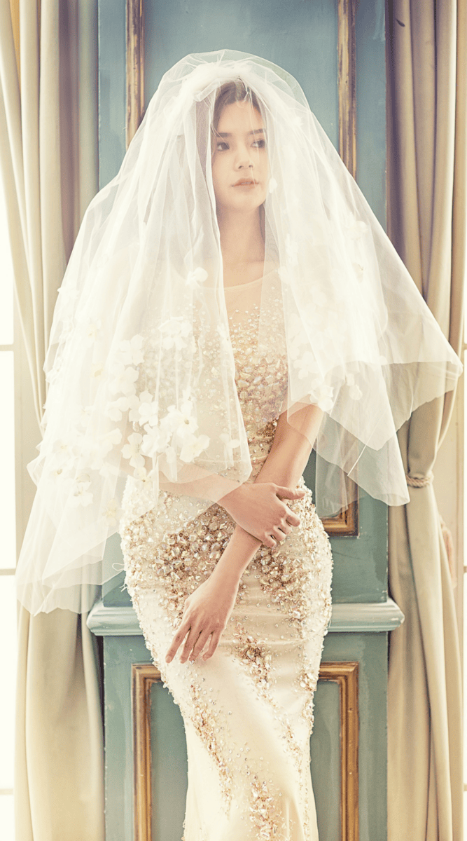 Embellished wedding gown with sheer veil