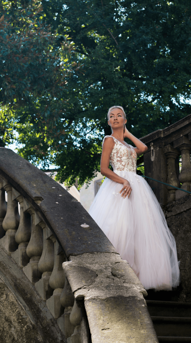 Tulle wedding gown on staircase