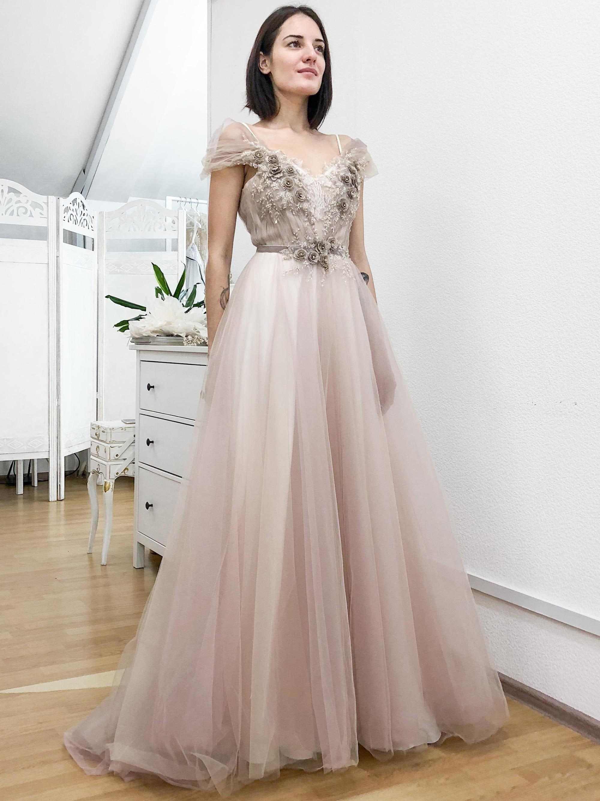 Blush wedding gown with floral details
