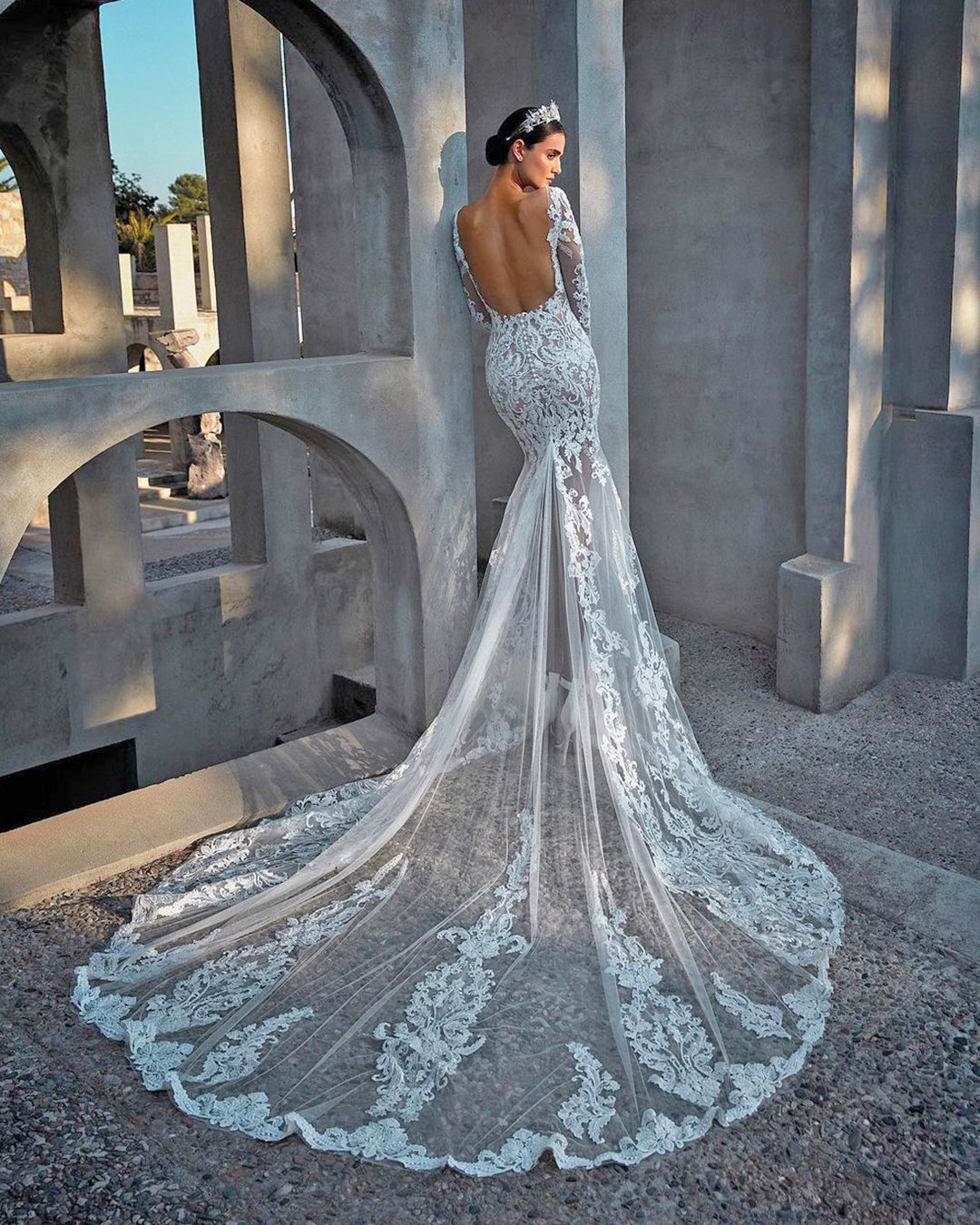 Backless lace wedding dress with long train