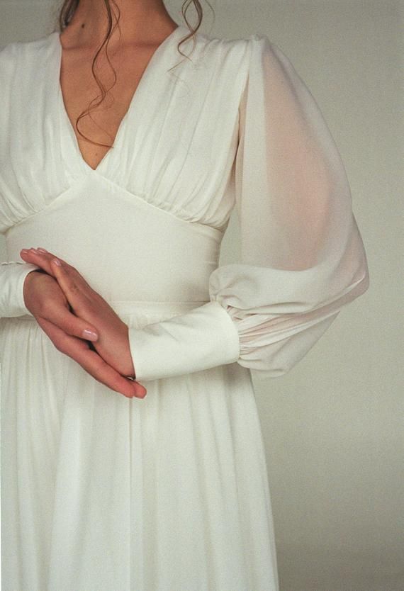 Bishop sleeve wedding dress with V-neckline