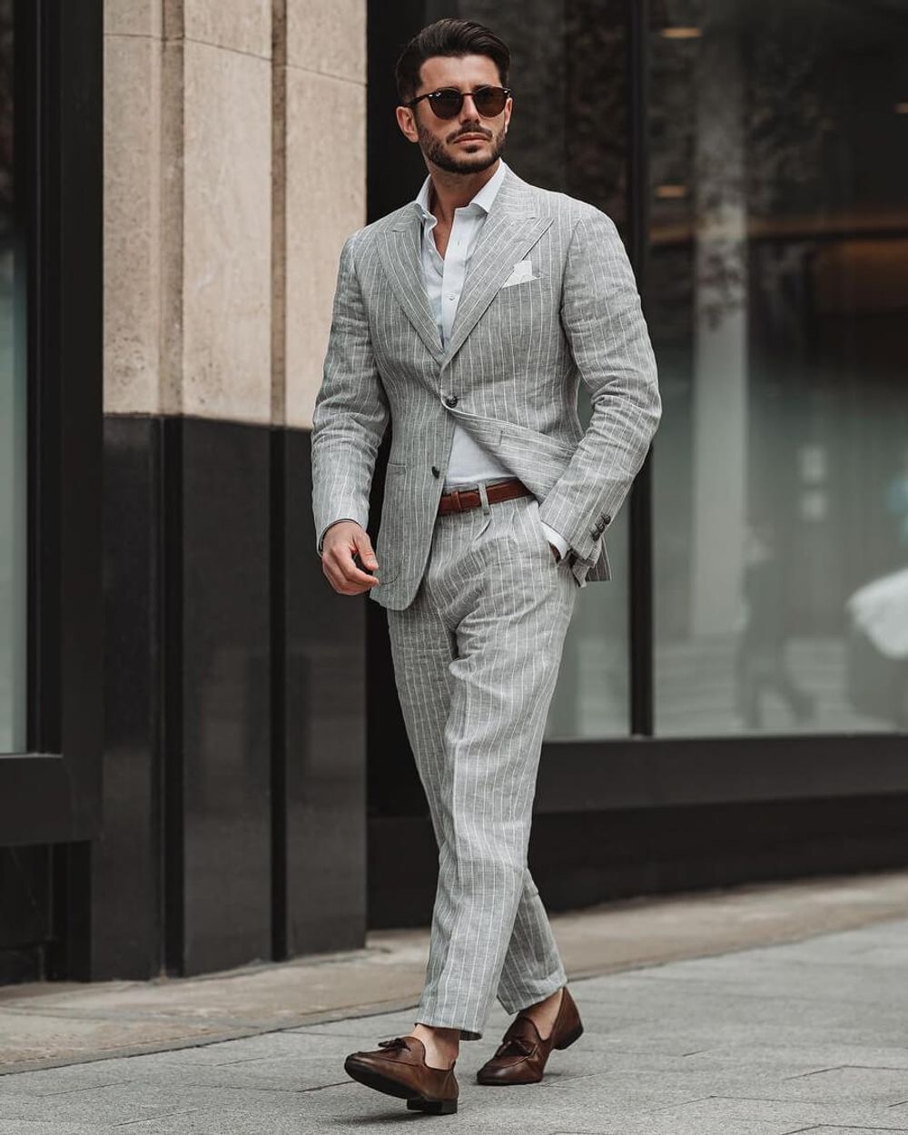 Grey pinstripe suit with casual loafers