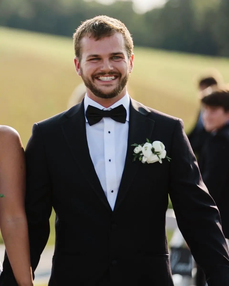 Black tuxedo with classic bow tie for formal weddings