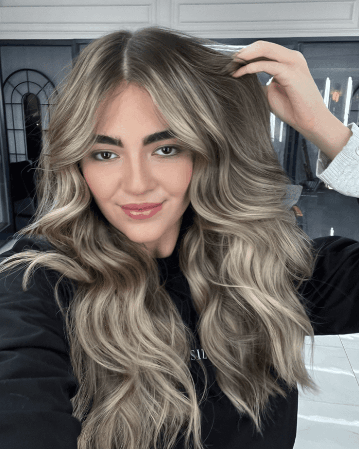 textured ash blonde natural waves hairstyle