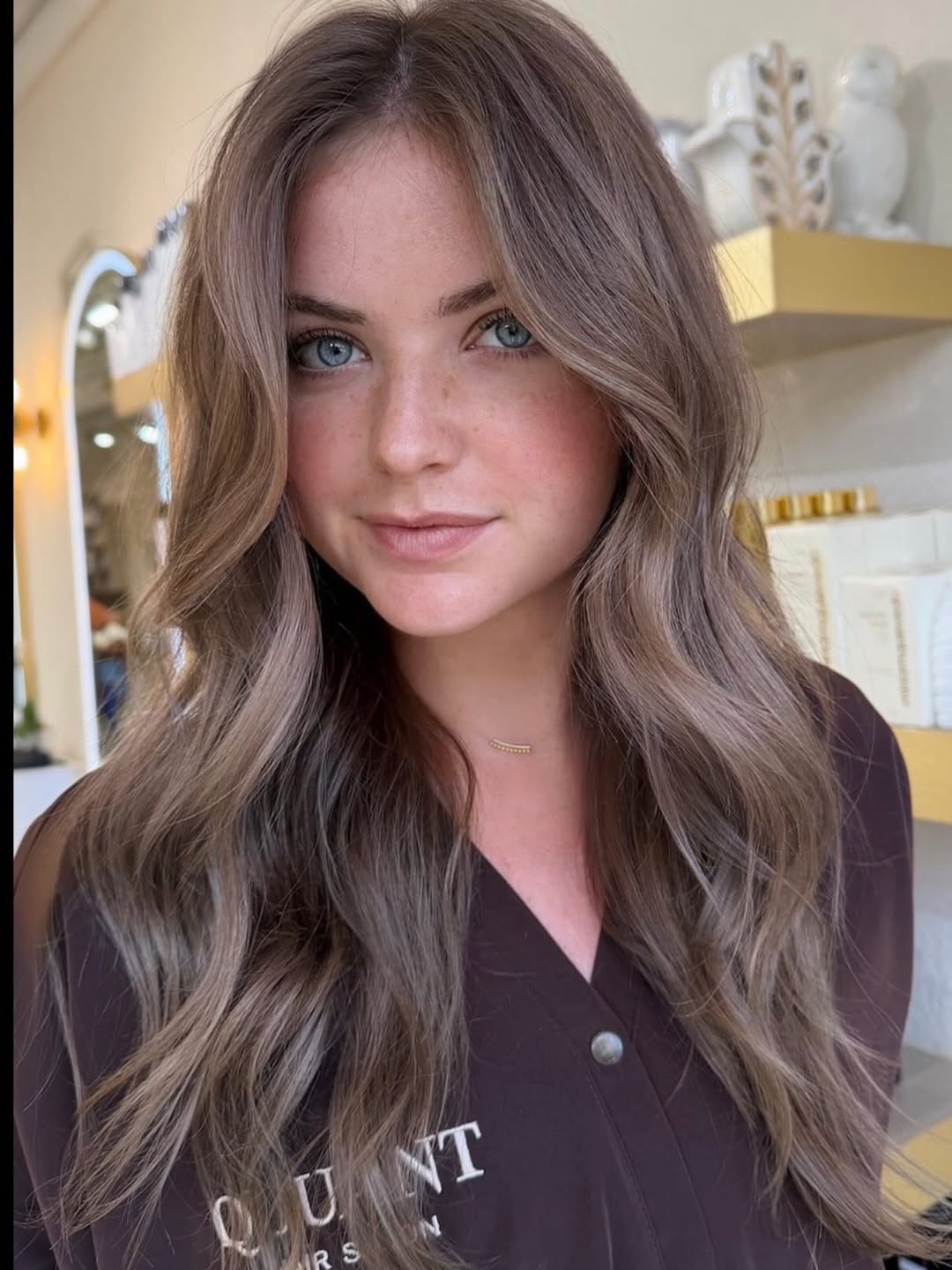 soft ash blonde waves with subtle highlights