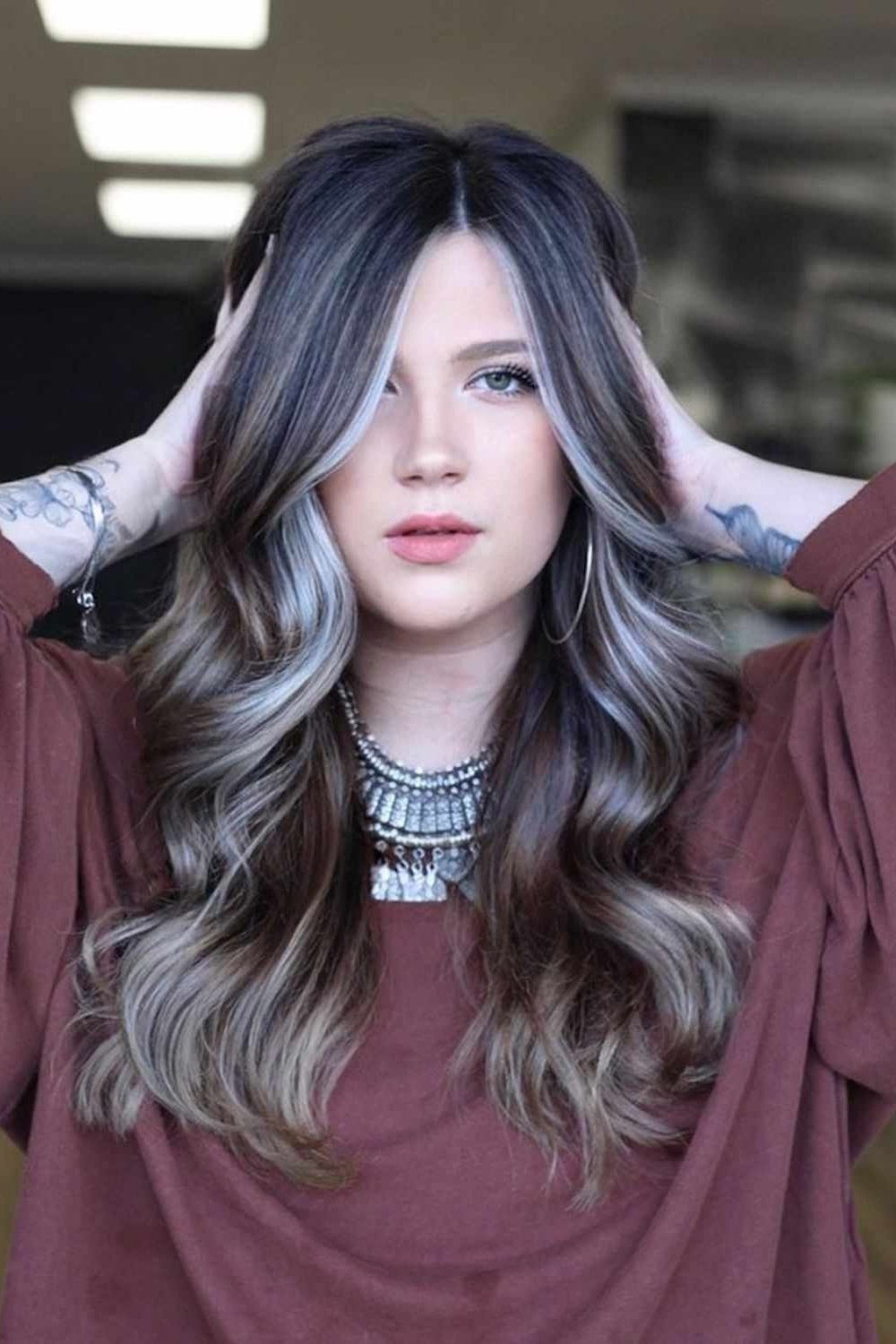 Bold face-framing contrast in ash brown hair