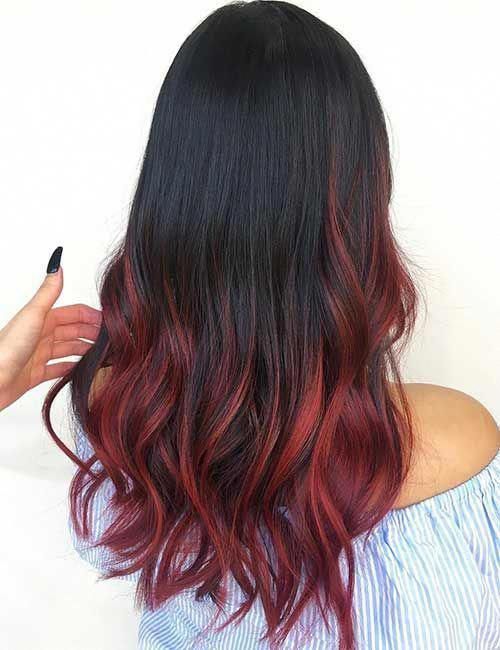 Dark hair with red ombre balayage highlights