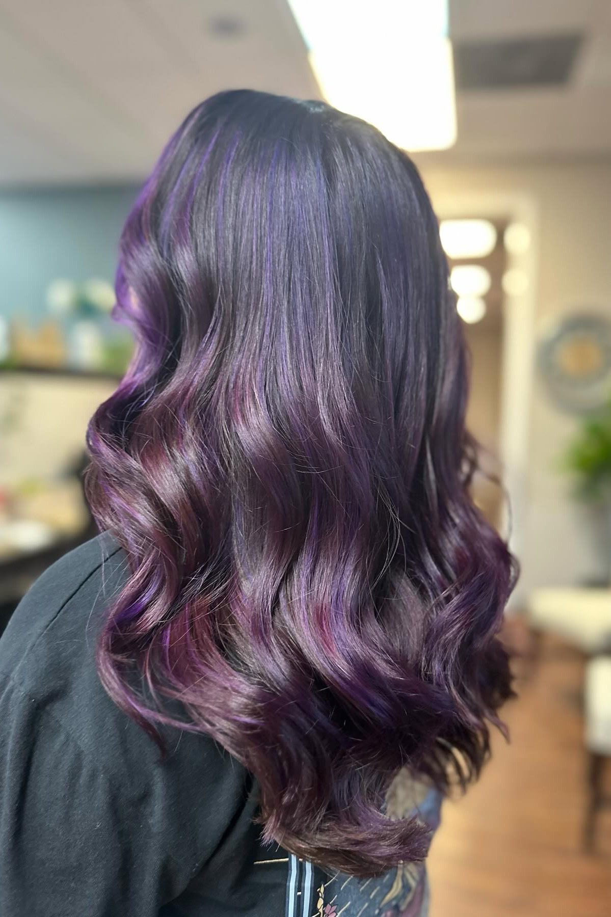Dark hair with violet balayage highlights