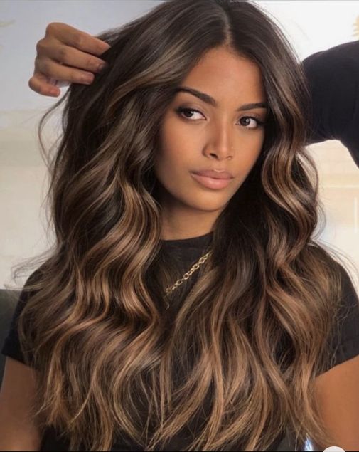 Voluminous waves with subtle balayage highlights