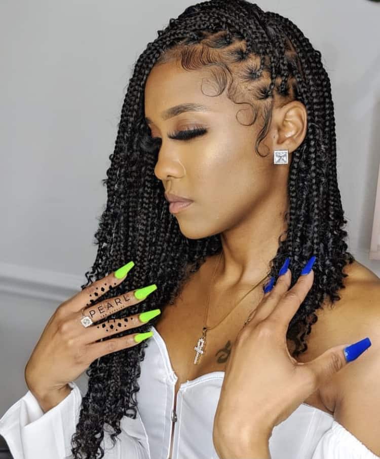 Intricate box braids with styled edges