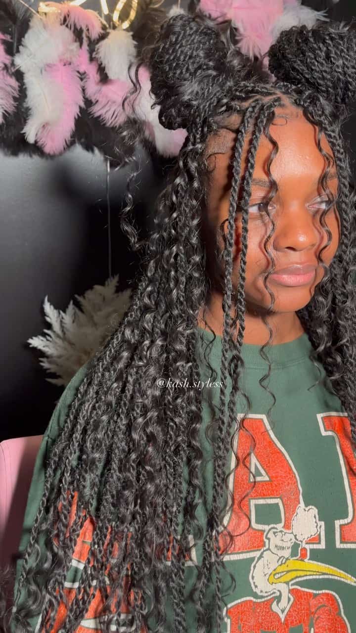 Long twists with playful space buns