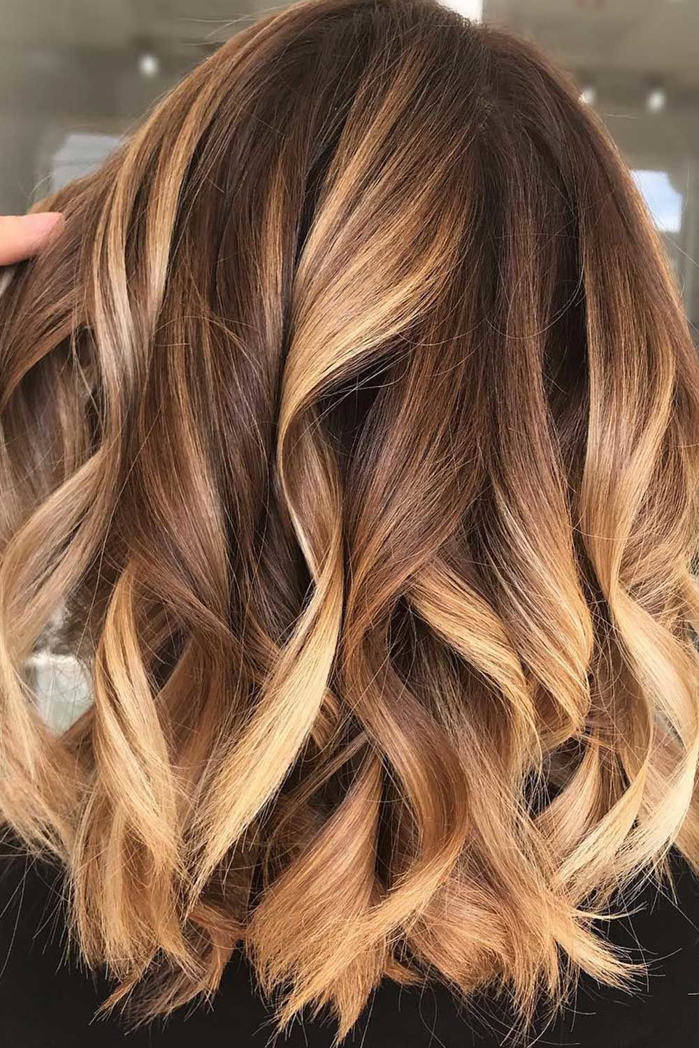 Caramel blonde with subtle highlights