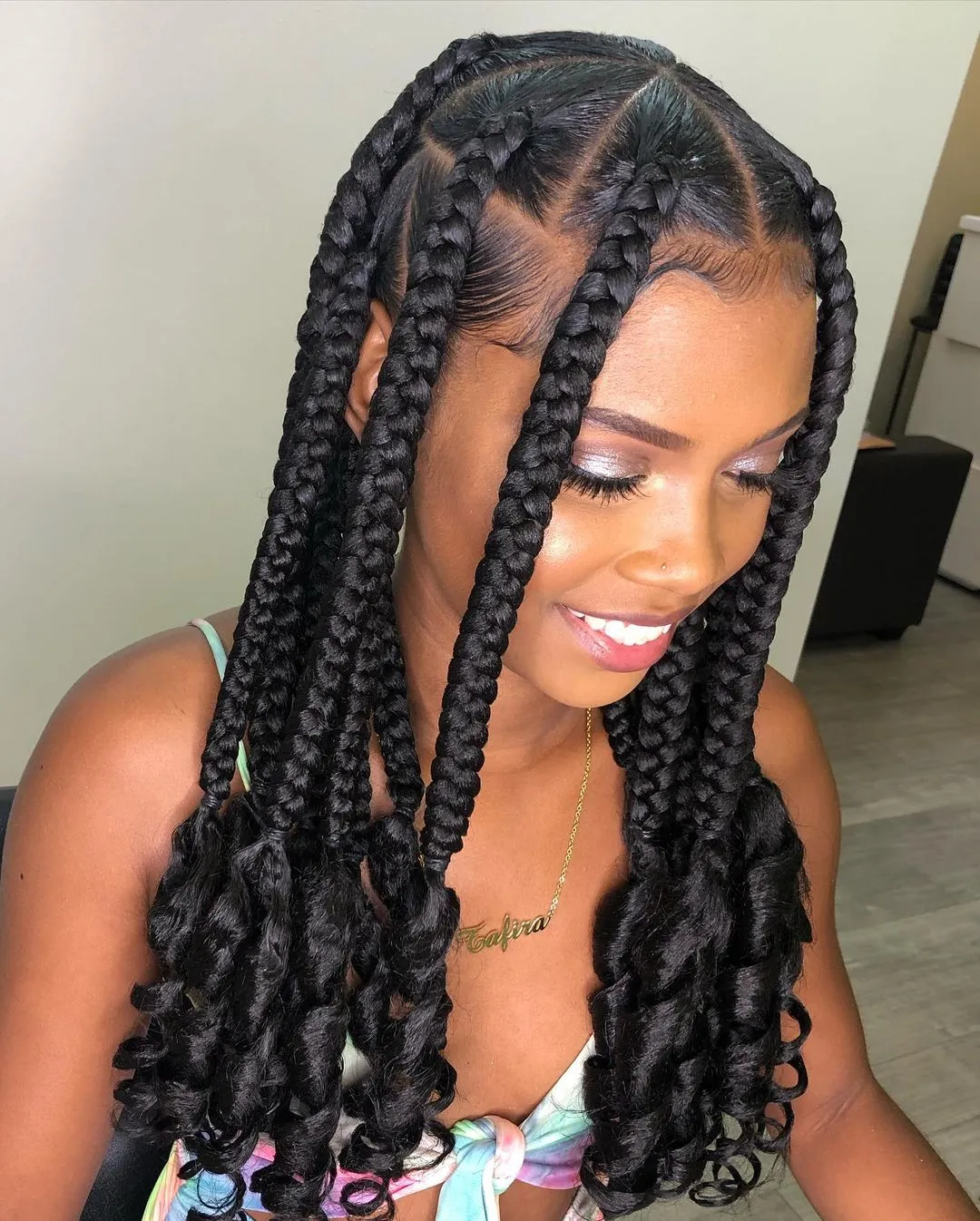 Defined curls with medium box braids